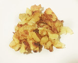Foto del paso 4 de la receta: Huevos fritos con patatas pochadas y pimientos dulces