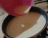 Foto del paso 3 de la receta: Panna cotta de coco🍮🥥 con coulis de jamaica y mezcal oaxaqueño