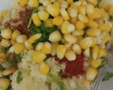 A picture of step 2 of Masala cheese and corn toast.
