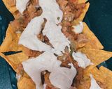 A picture of step 21 of Cheesy nachos platter😋😋❤️.