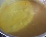 A picture of step 8 of Karhi with boil rice.