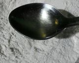 A picture of step 14 of Moong Dal Kachauri.
