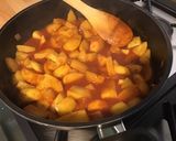 Une image de l'étape 9 de Pommes de terre à la tomate, coriandre et épices.