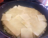 Foto del paso 6 de la receta: Tortilla de papas rellena con queso y jamón