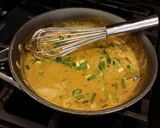 A picture of step 8 of Roast Pork Tenderloin with a Green Peppercorn Cream Sauce.