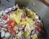 A picture of step 1 of Pyaaz Aaloo Salan.