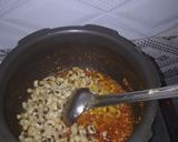A picture of step 4 of Aloo (potato) bada with curry.