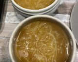 A picture of step 4 of Onion and Beer Soup.