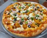 A picture of step 14 of Chicken Tikka Pizza.