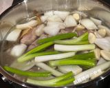 A picture of step 8 of Korean-Style Potato and Pork Rib Soup.