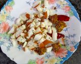 A picture of step 2 of Chicken vadaga curry.