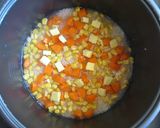 A picture of step 3 of Colourful Smoked Ham Takikomigohan.