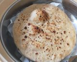 A picture of step 4 of Whole wheat (laal atta) sesame seeds naan on tawa.