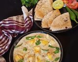 A picture of step 6 of Nawabi Paneer Korma in white Gravy.
