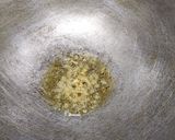 A picture of step 2 of Baingan Bhaji.