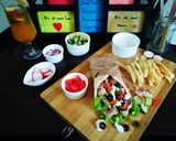 A picture of step 9 of Chicken Gyros Street food of Greek.