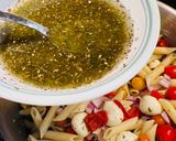 A picture of step 4 of Mozzarella and Tomato Penne Lemon Salad.