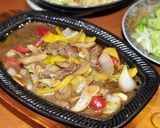 A picture of step 8 of Teppanyaki-Style Stir-Fried Beef with Scallions.