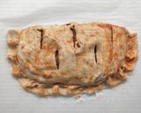 Foto del passaggio 6 della ricetta Calzone ripieno di coste indiavolate