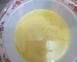 A picture of step 5 of Steamed rice with scrambled eggs and cucumber salad.