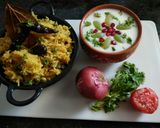 A picture of step 8 of Veg Pulav with Fruit Raita.