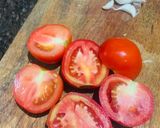 A picture of step 2 of Kaddi patalghanta chudchuda (Roasted tomato with bamboo shoots).