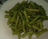 صورة لخطوة 1 من وصفة كوتليت مع الخضر في الفرن بنة هبال 😋😋