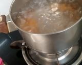 A picture of step 7 of Mango Boba Drink (with homemade mango bubbles).