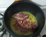 Foto del paso 2 de la receta: Guisado de guisantes y jamón