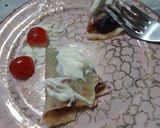 Foto del paso 4 de la receta: Panqueque flambeado con mermelada de arándanos y yogurt