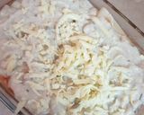 A picture of step 6 of Chicken Alfredo Lasagna Rollup.