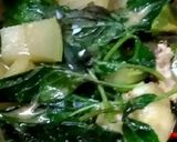 A picture of step 7 of Green Curry Squid in Young Coconut.