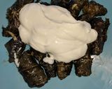 A picture of step 11 of Stuffed vine leave rolls.