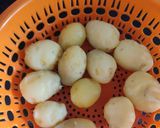 A picture of step 1 of Dum Aloo-.