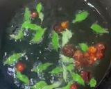 A picture of step 12 of Sweet and sour Tomato Curry serve with white rice.