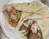 A picture of step 5 of Chicken zinger wraps in tortilla bread.