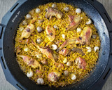 Foto del paso 6 de la receta: Arroz con conejo y caracoles al romero