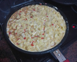 Foto del paso 3 de la receta: Tortilla de papas con cebolla caramelizada y pimiento del piquillo