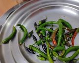 A picture of step 4 of Lemon mango ginger chilli.