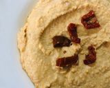 A picture of step 2 of Whole Wheat Crostini with Hummus.