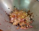 A picture of step 2 of Lonka Roshun Pora Masala Chicken.