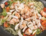 Foto del paso 2 de la receta: Filete de Merluza al Horno y Arroz con Calamares 🦑