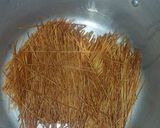 A picture of step 2 of Fried spaghatti.
