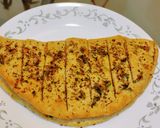 A picture of step 13 of Stuffed Garlic bread.