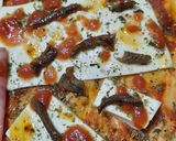 Foto del paso 5 de la receta: Pizza con tomate fresco (2 mitades)