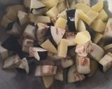 A picture of step 1 of Potato brinjal ki sabji.