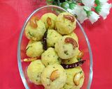 A picture of step 12 of Suji coconut balls.