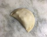 A picture of step 5 of Coconut Gujia.