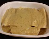 A picture of step 21 of Crab and Shrimp Enchiladas with Hatch Chili Sauce.