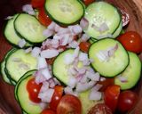 A picture of step 1 of Cucumber and Cherry Tomato Salad.
